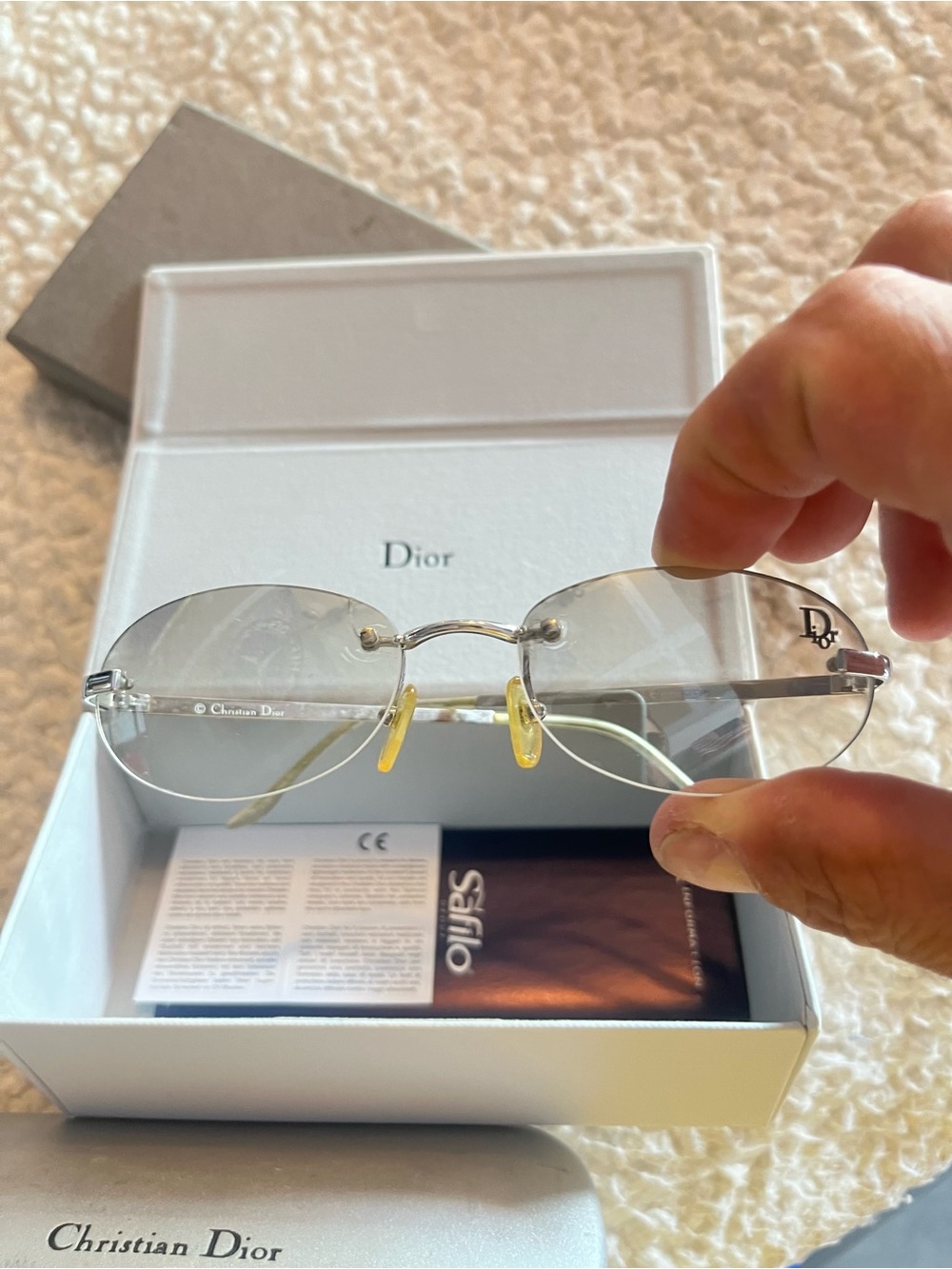 Dior clear Rimless Sunglasses in Silver with Yellow Nose Pads made in Italy.